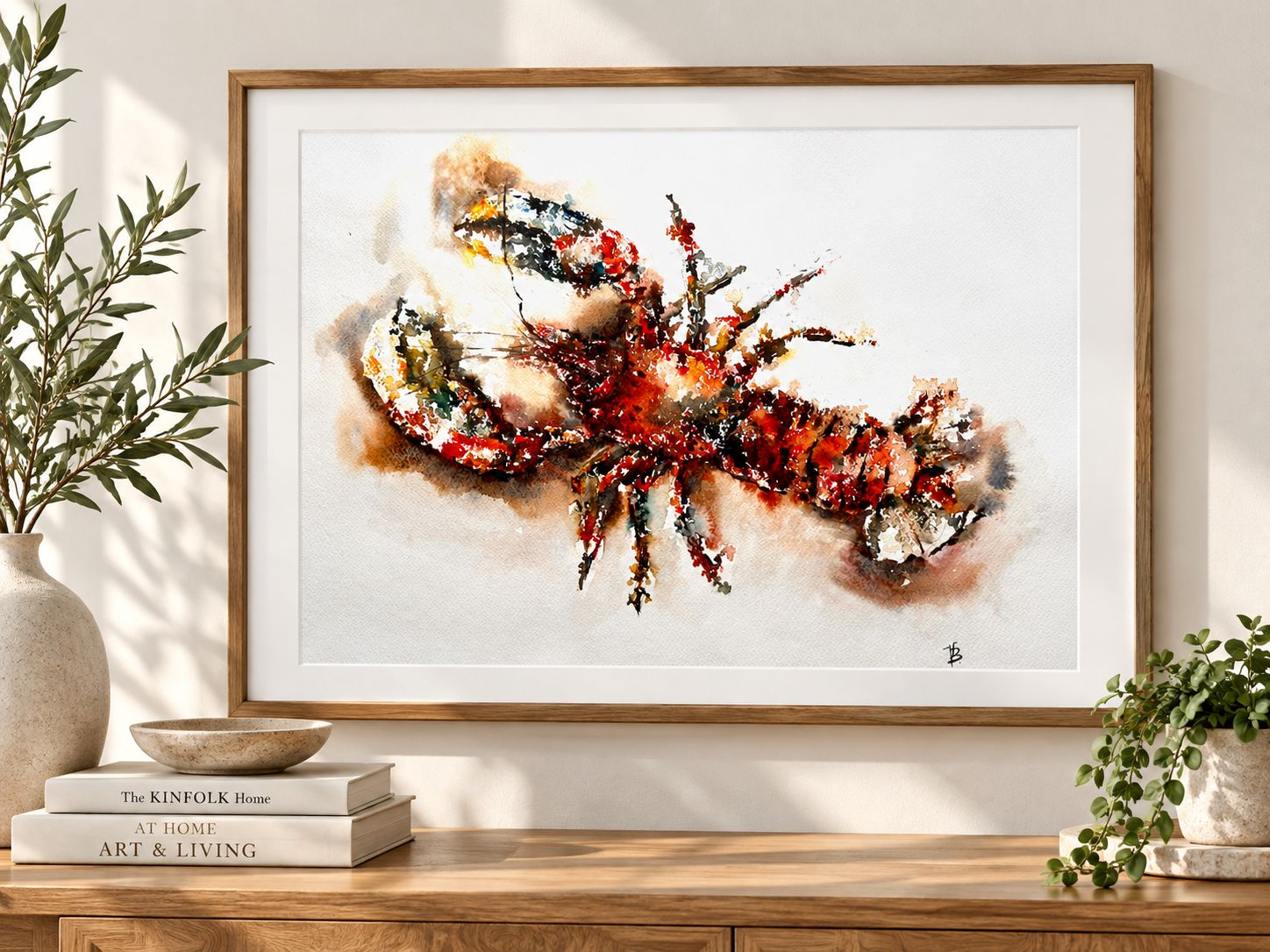Lobster watercolour print shown framed in a kitchen interior. Art print by Viktoriia Bezugla
